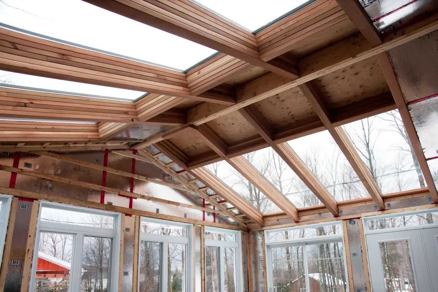 Home addition under construction during a Twin Cities building season