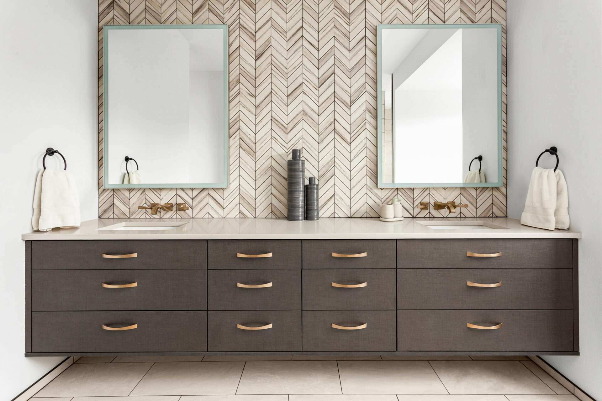 Bathroom vanity with double sinks in a remodeled bathroom