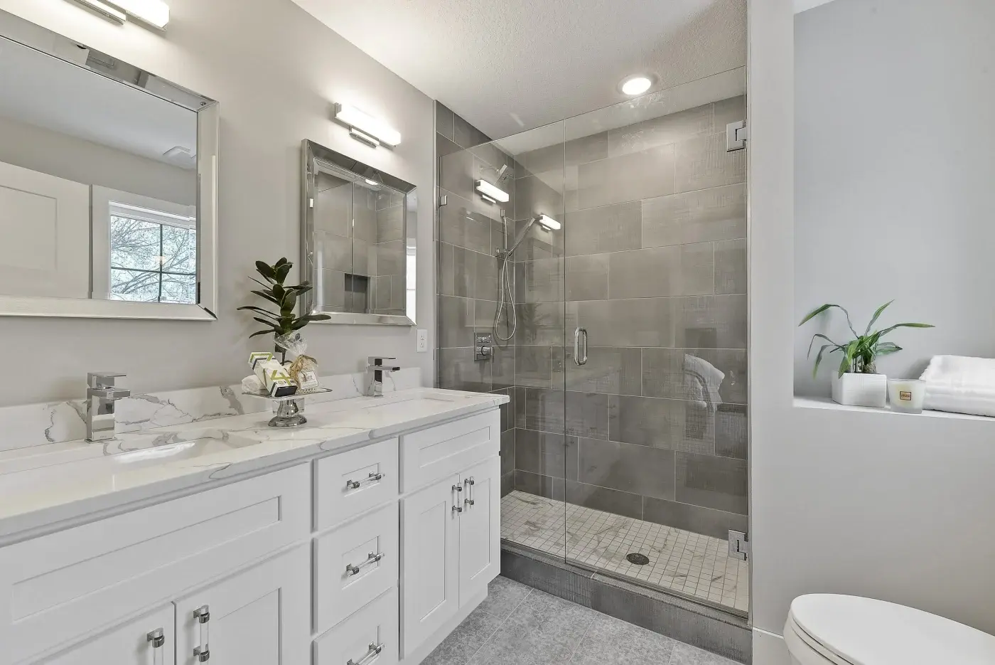 Remodeled bathroom in a Twin Cities home with updated tile and fixtures