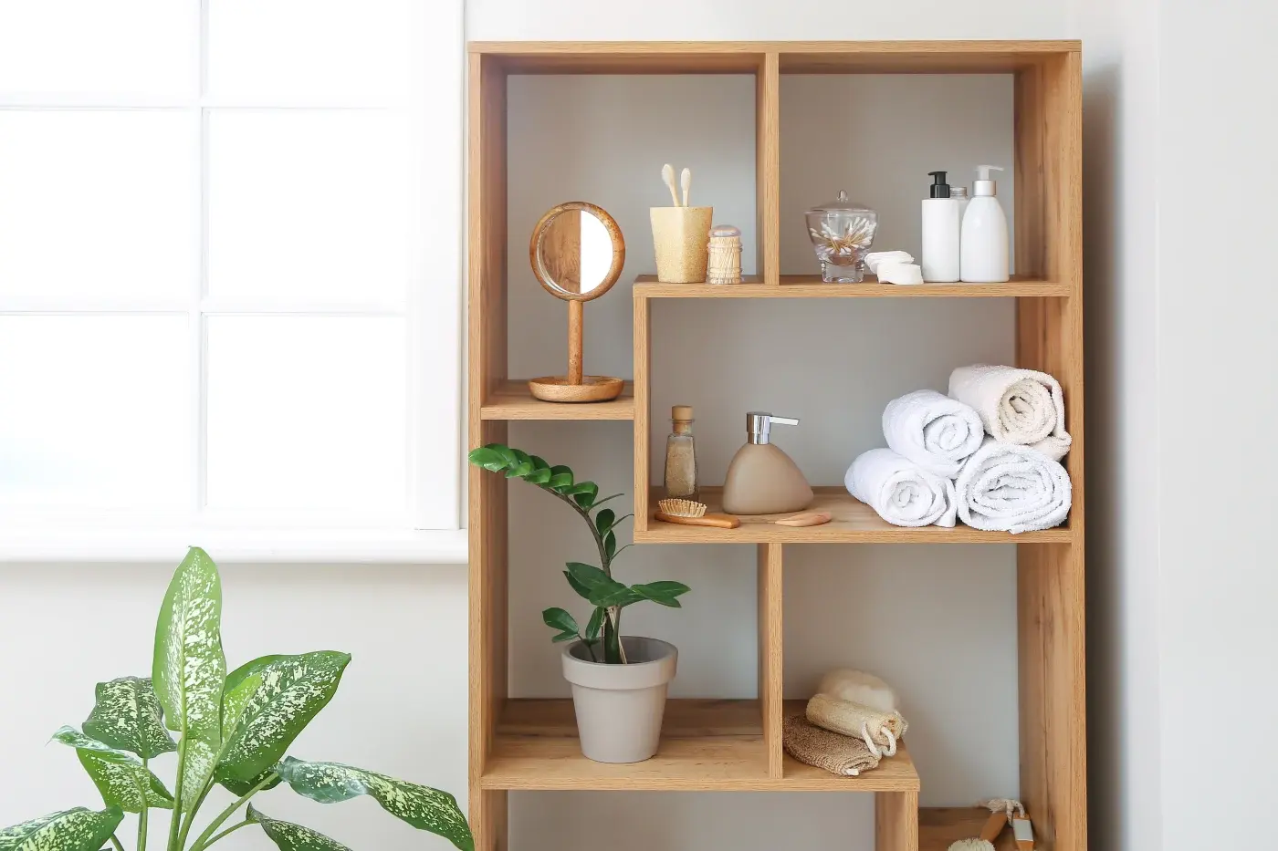 Bathroom remodel with built-in shelving and creative storage