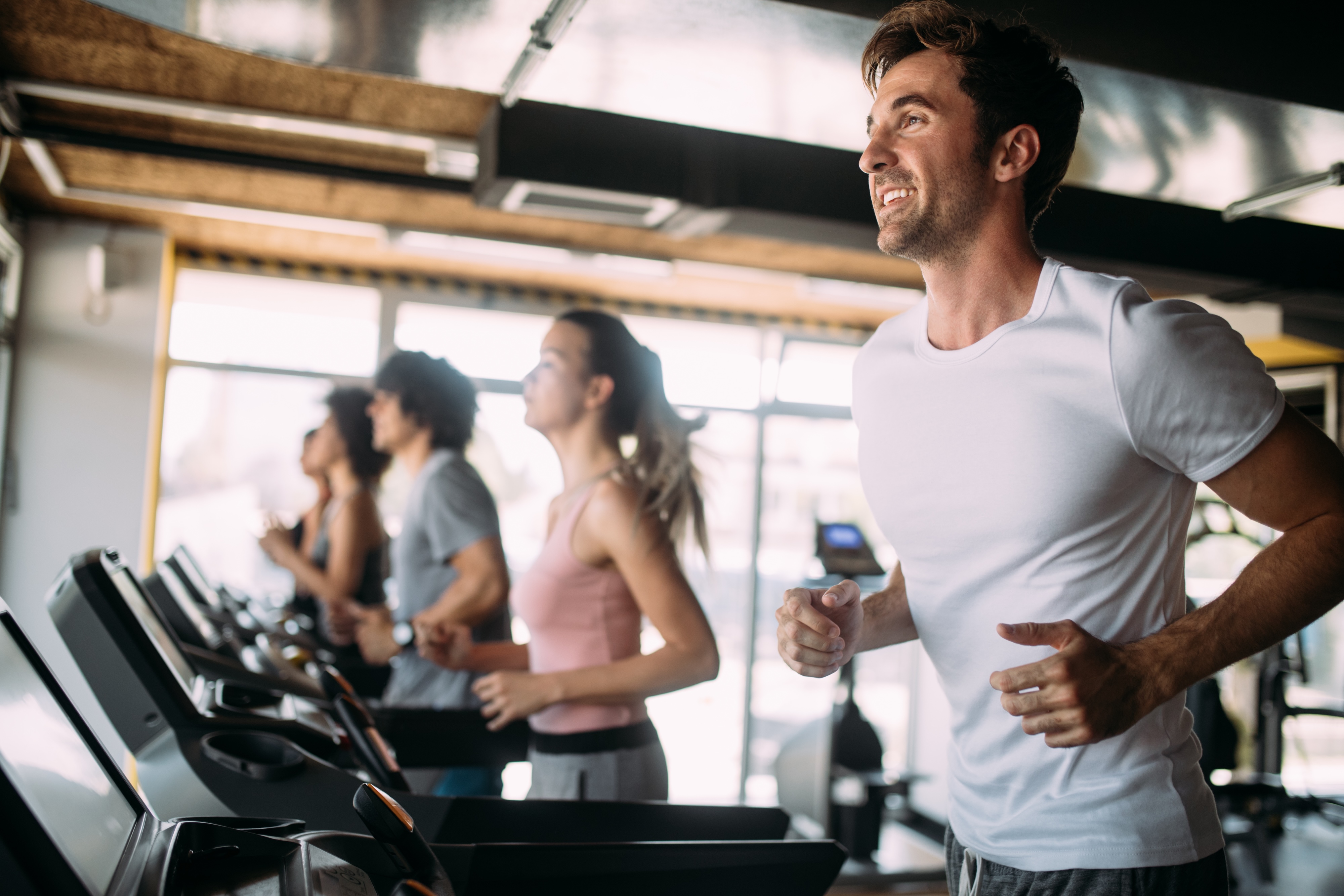 Man Running on Treadmill Stock Photo