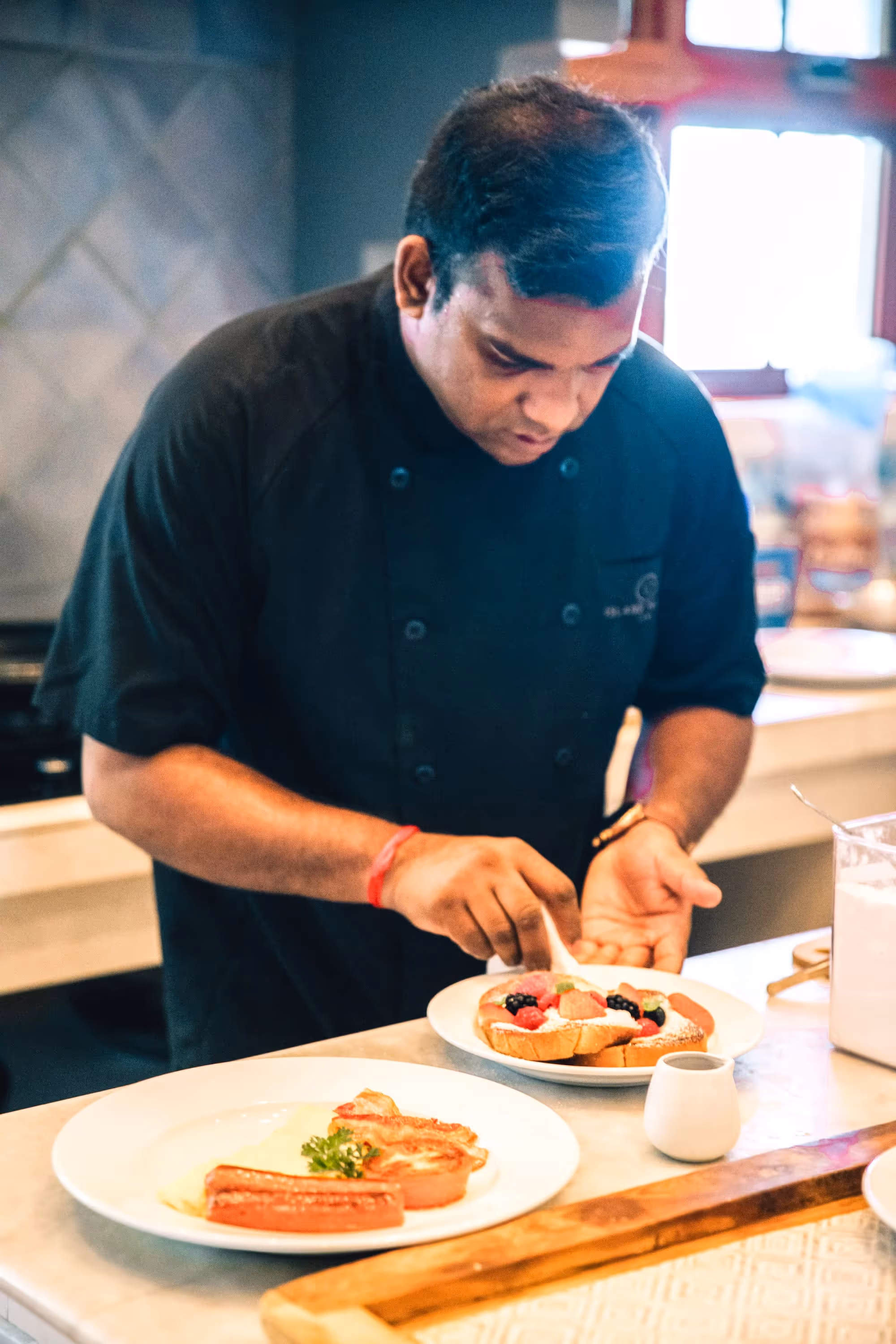 Island House LVM team members participating in a community beach cleanup in Turks and Caicos.