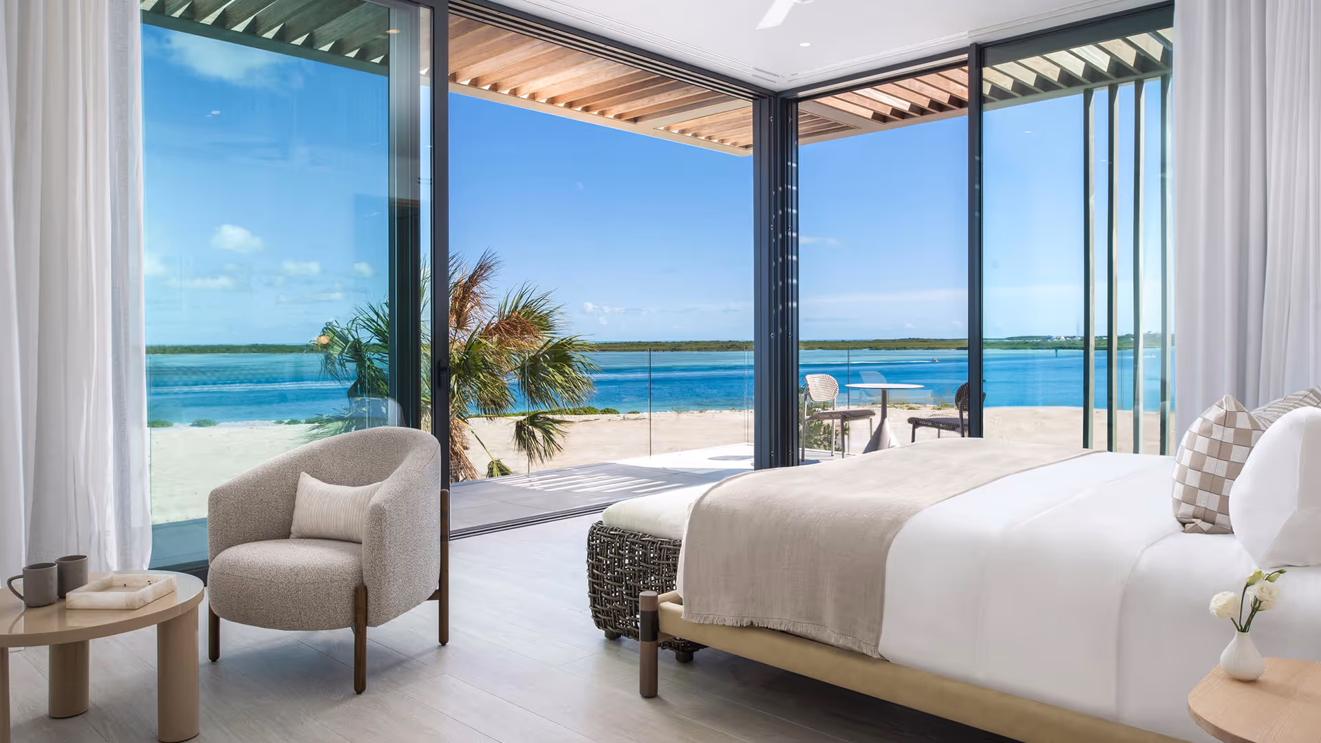 Island House LVM team members participating in a community beach cleanup in Turks and Caicos.