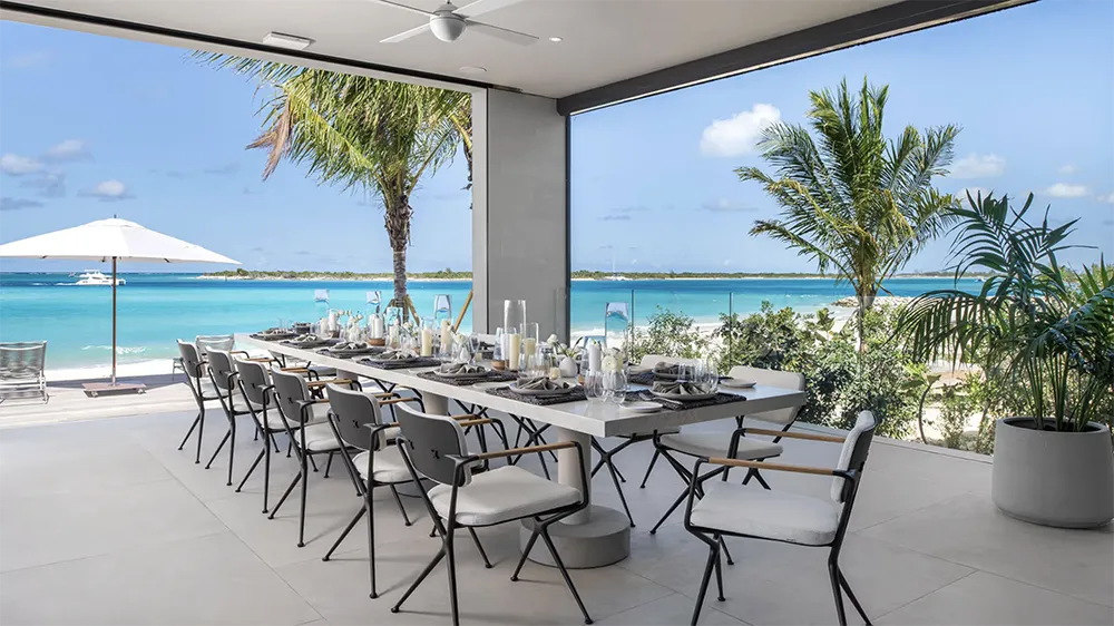 Island House LVM team members participating in a community beach cleanup in Turks and Caicos.