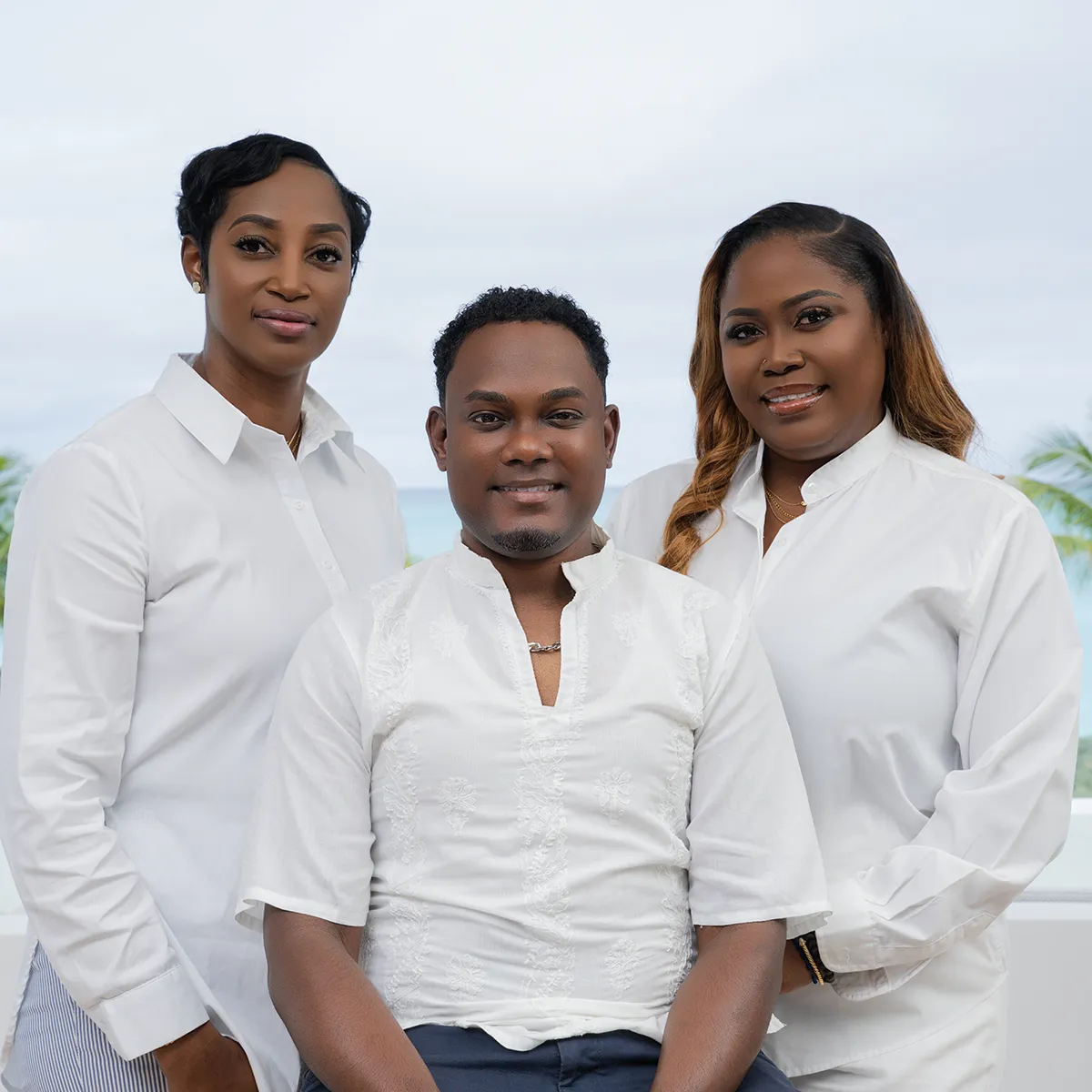 Two smiling Island House LVM team members representing the 'Our People' community culture.