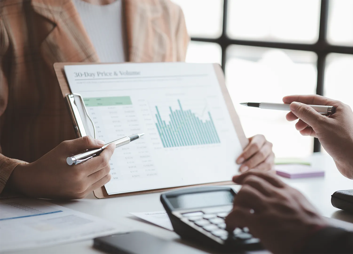 Financial consultant reviewing charts