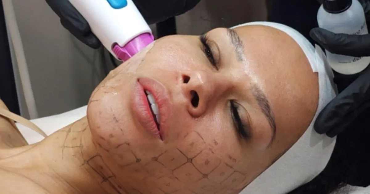 Close-up of four diverse individuals lying side by side with calm expressions.