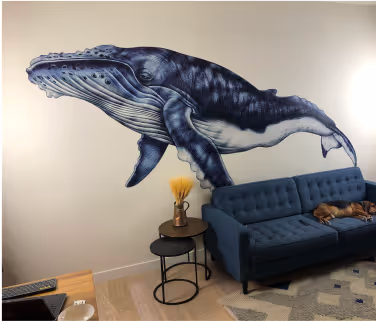 a whale design print on a wall