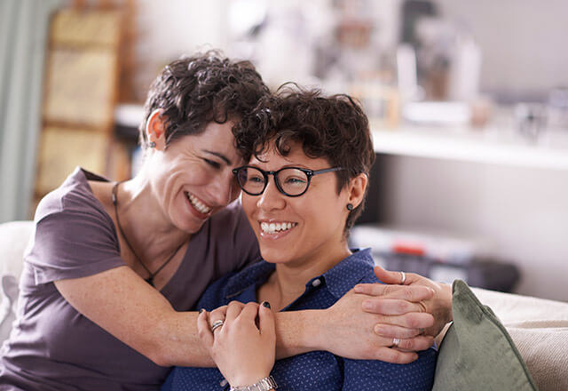 nurse practitioner patient consultation clinic ,healthcare provider talking with patient clinic primary care consultation natural light