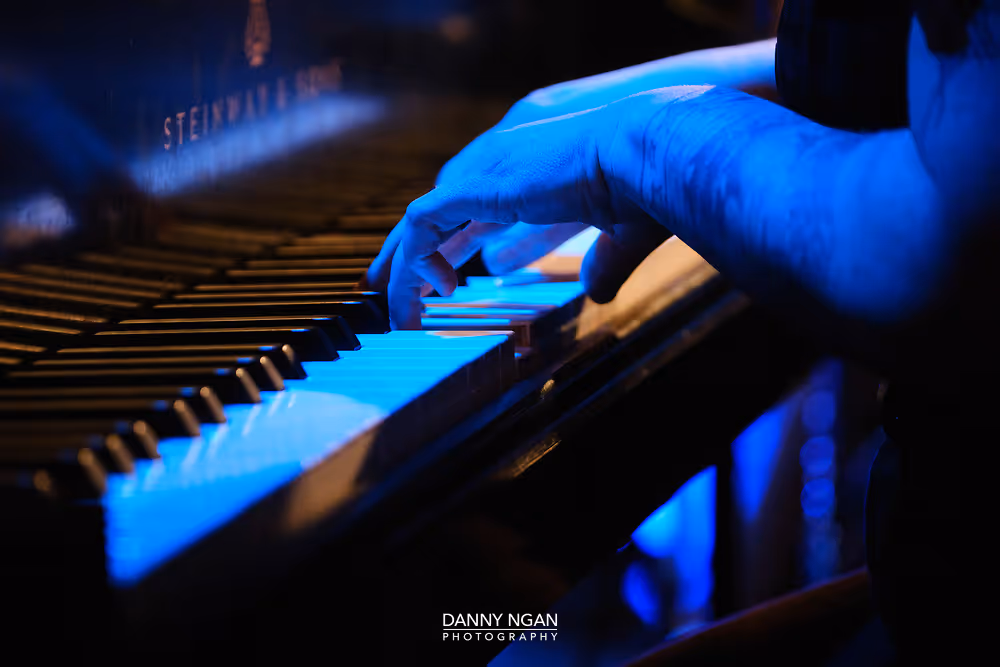 Closeup of Megan playing piano