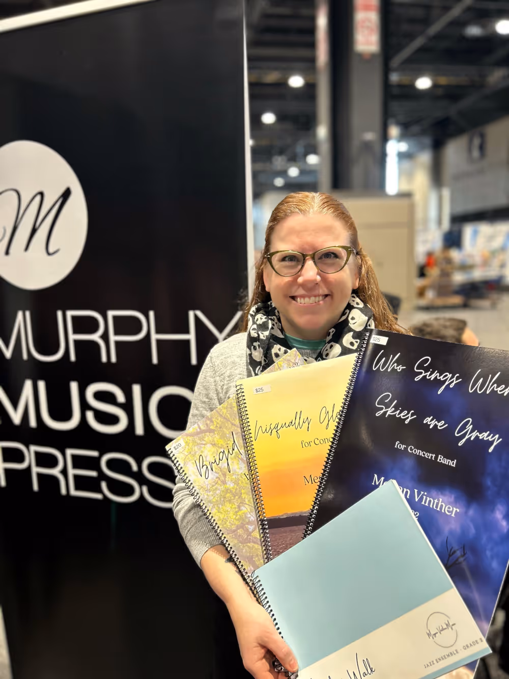 Megan showcasing compositions at Midwest Band Clinic