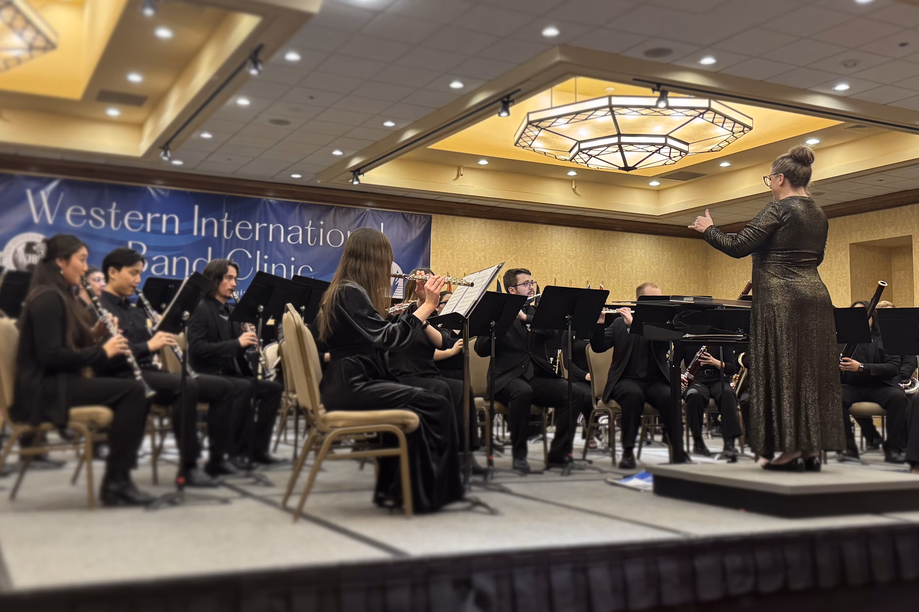 Megan conducting at WIBC