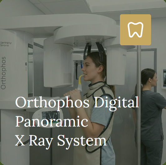 A patient positioned in an Orthophos panoramic dental X-ray unit.