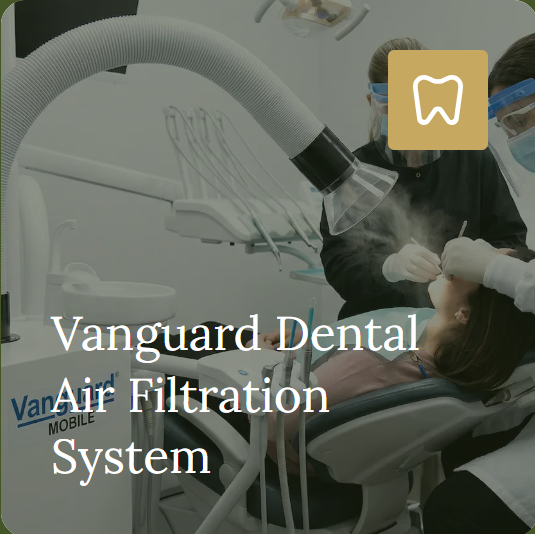 A Vanguard extraoral air-filtration arm positioned beside a dental chair.