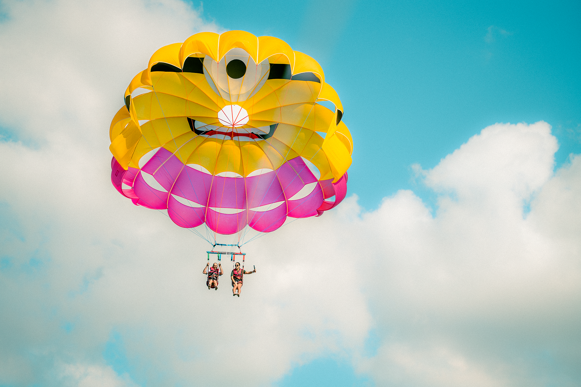 two people tandem parachuting