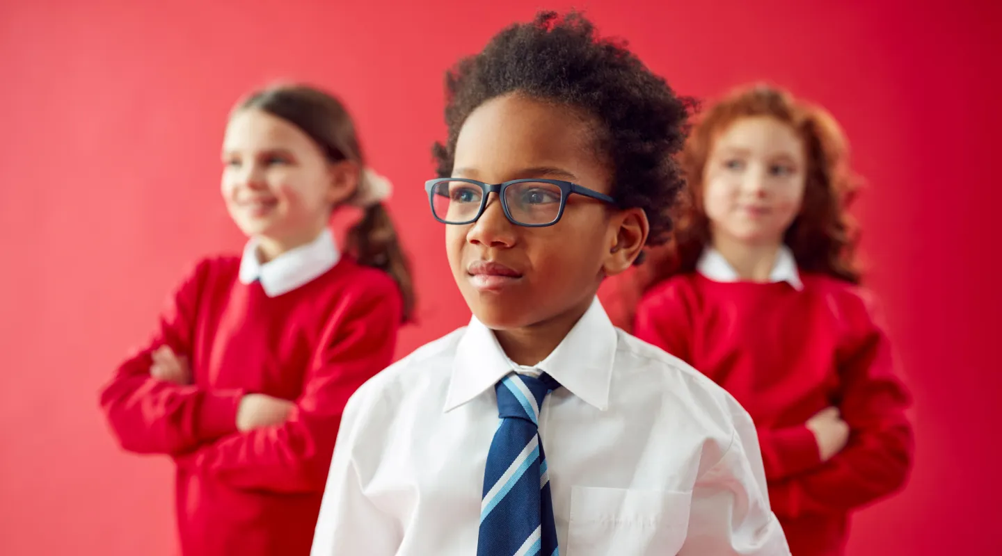 School children wearing prescription glasses showing quality children's eyewear for academic success