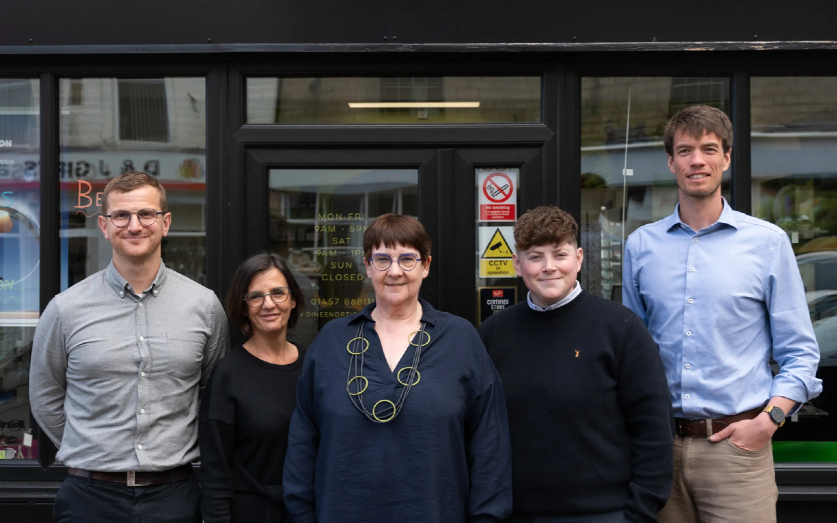 Professional optometry team at Dineen Opticians practice providing expert eye care services