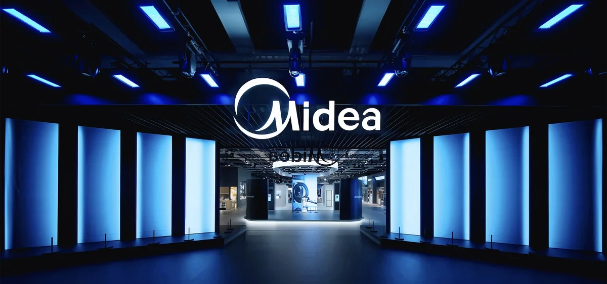 LED pivot door opening at Midea exhibition booth, IFA Berlin 2025, kinetic LED used as an entrance threshold