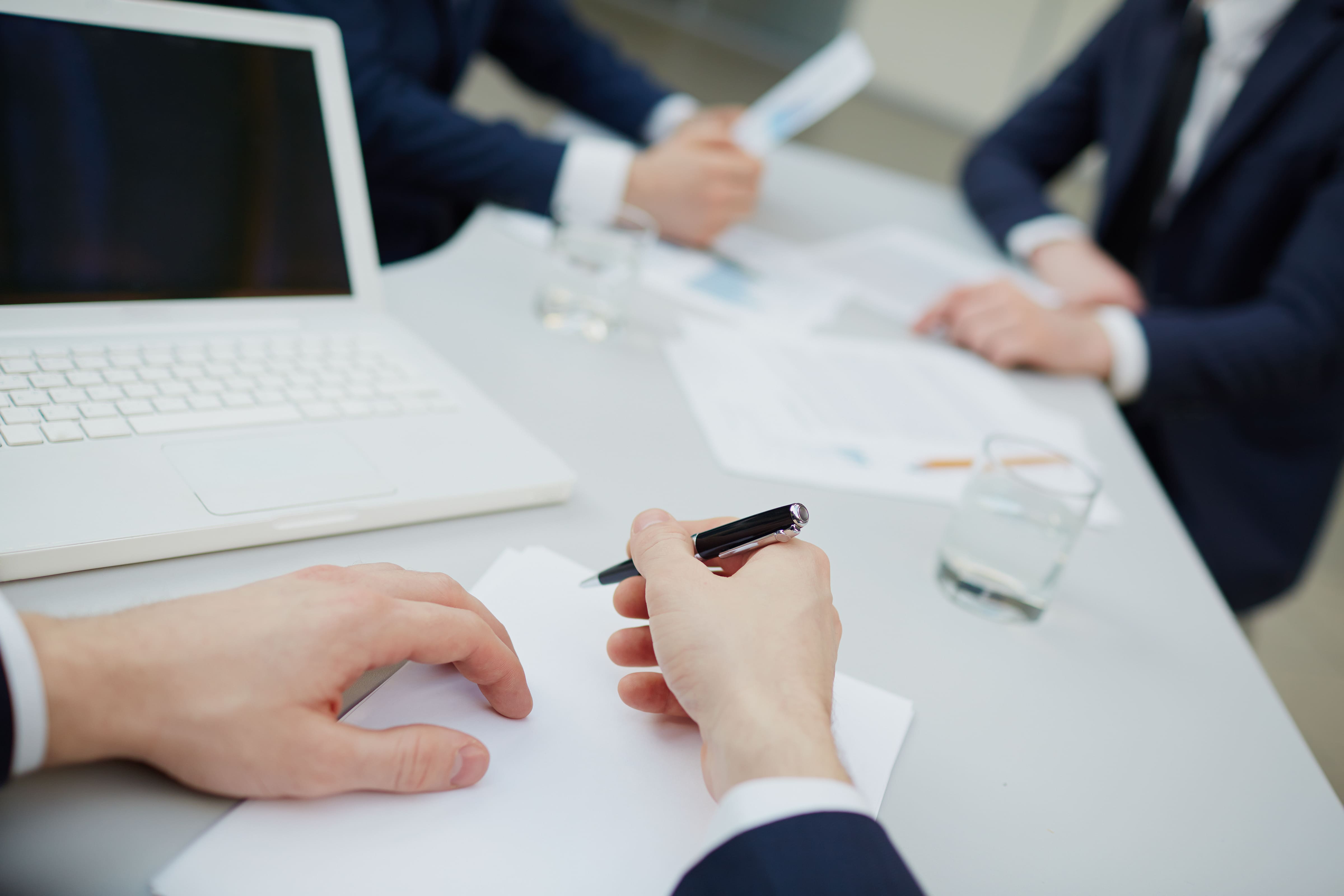 image of legal documents being signed