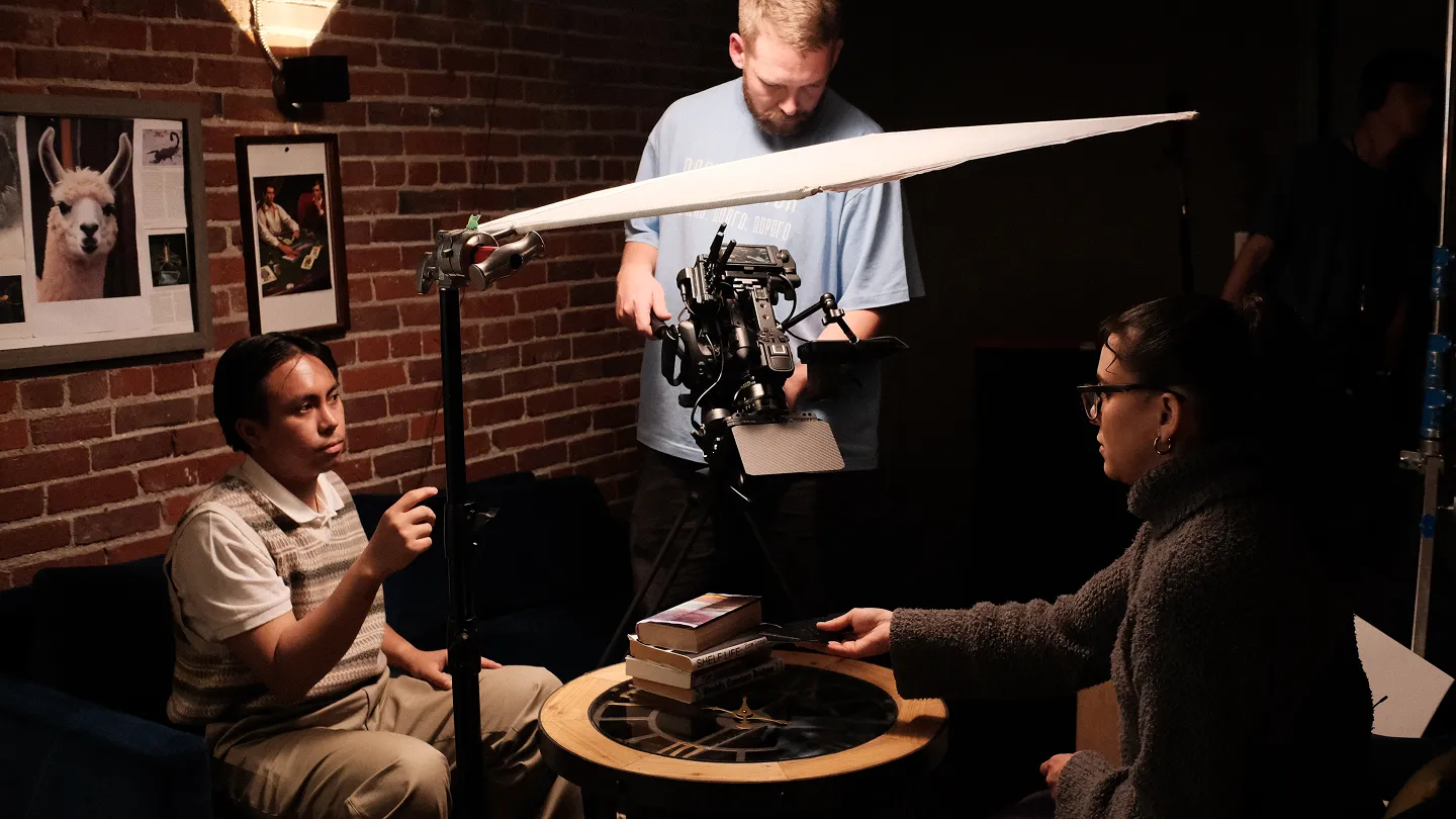 Film crew with camera equipment shooting at Click Click loft event space in Vancouver