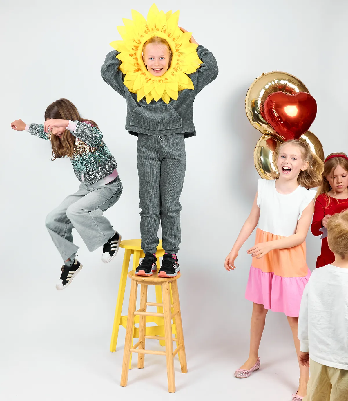Child enjoying a creative photo session at Click Click Vancouver