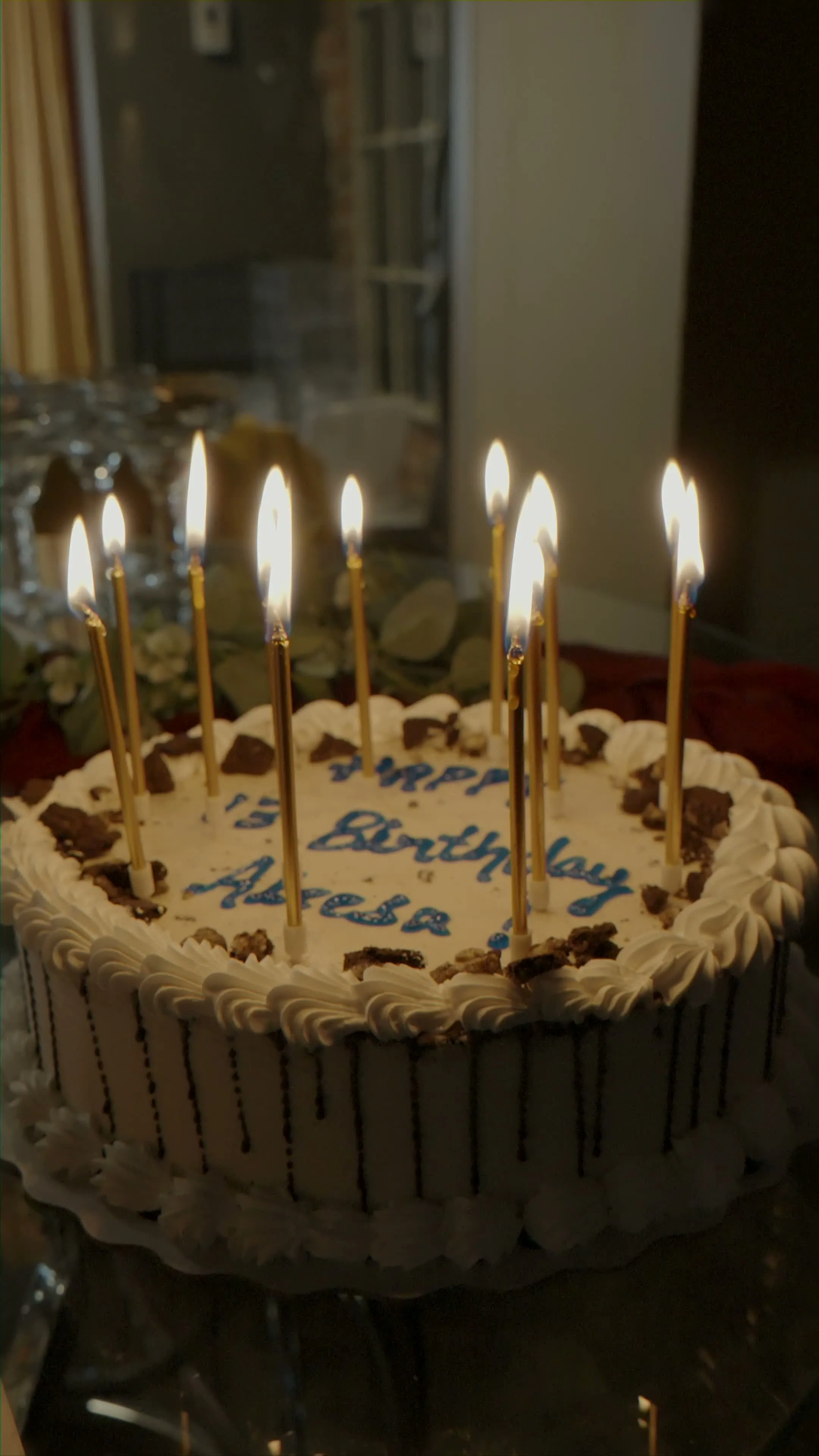 Birthday cake with lit candles at a Click Click kids party