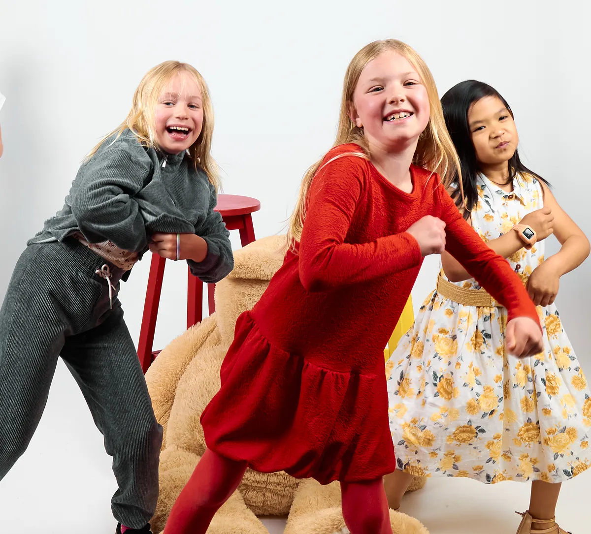 Kids posing together during a self-portrait birthday session