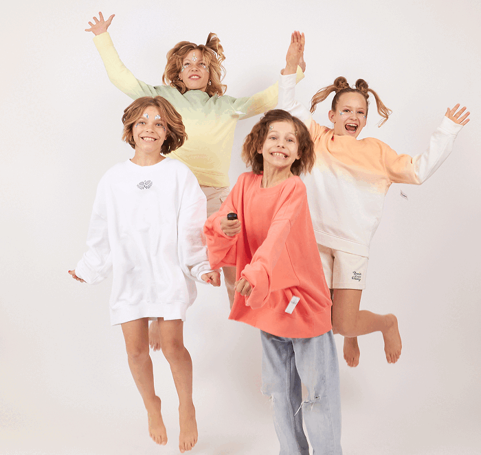 Kids posing with a disco ball during a Click Click birthday party