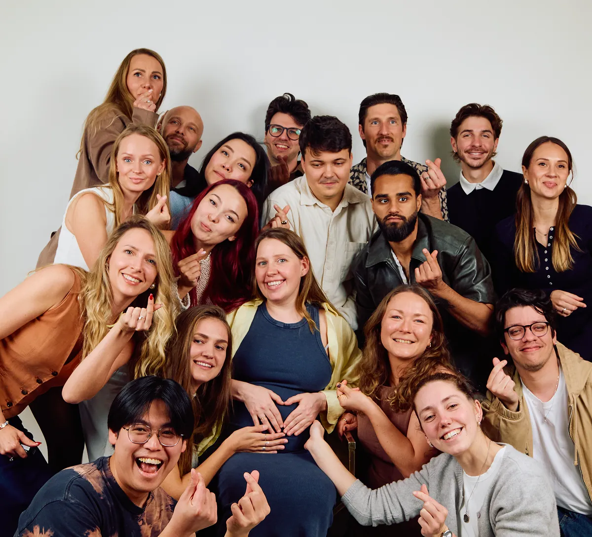 Large group posing together during a Click Click self-portrait session