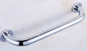 Portable short metal ramp with black anti-slip surface installed over outdoor stone steps.