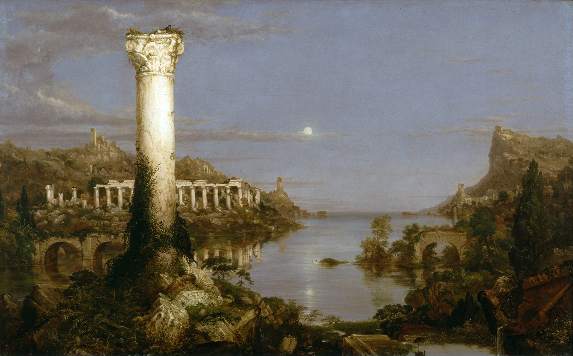 Ancient ruins with a tall column covered in ivy overlooking a calm river under a moonlit sky.