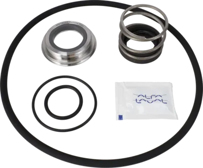 Pumper service kit with metal spring, metal ring, several rubber O-rings, and a small packet labeled Alfa Laval.