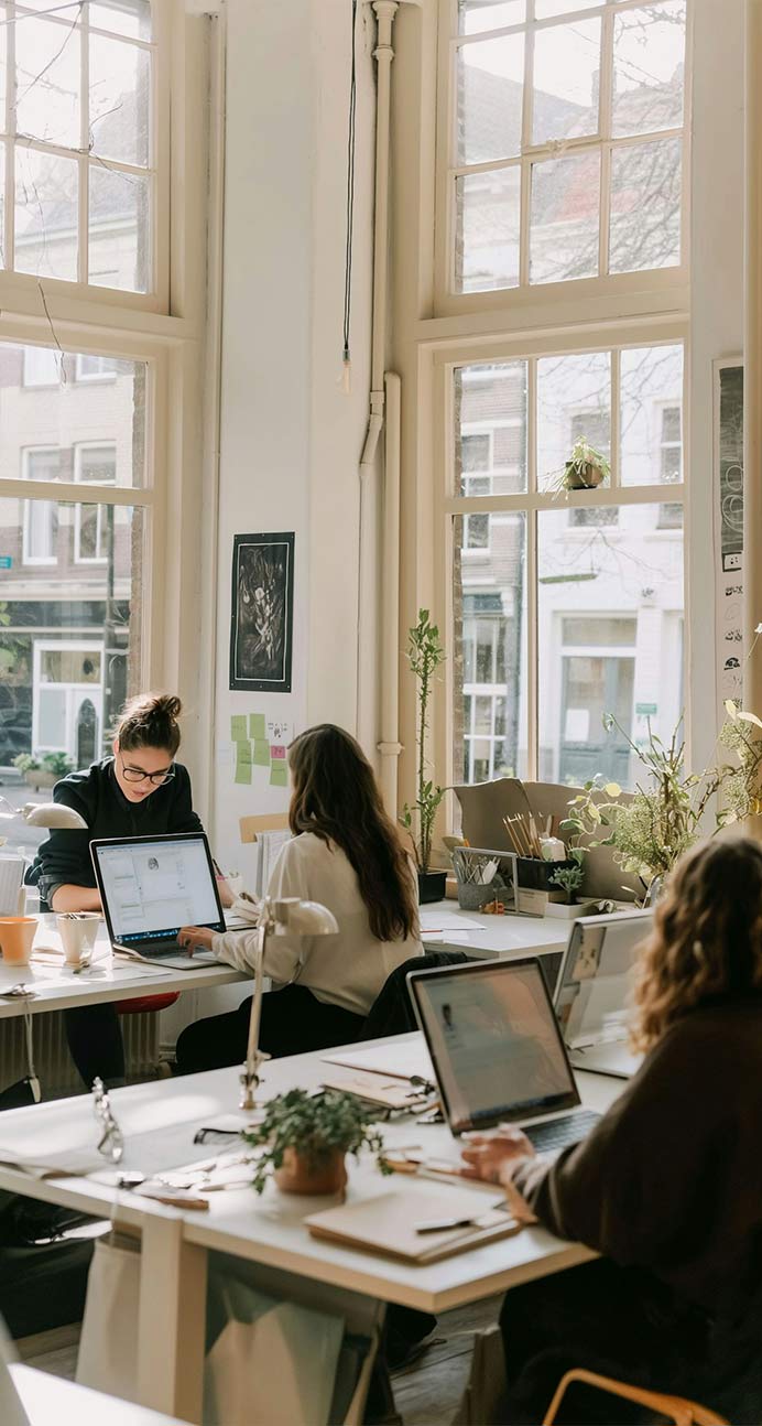 Creative office space with working people.