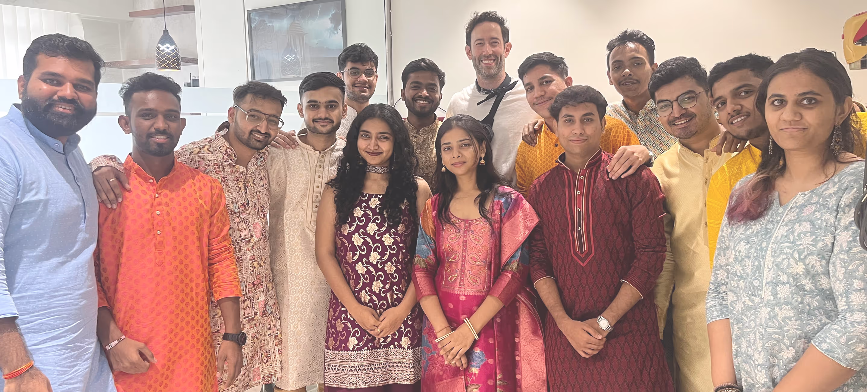 Group photo of the Metaminds Studio team, showcasing a diverse and creative team of designers, developers, and strategists