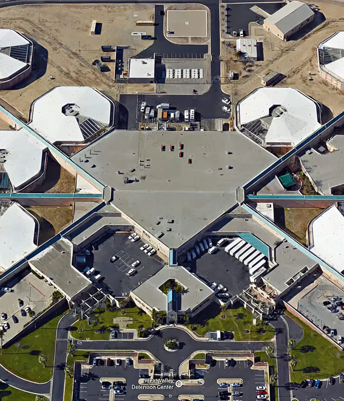 Aerial view of West Valley Detention Center with multiple connected buildings, parking lots, and surrounding roads.