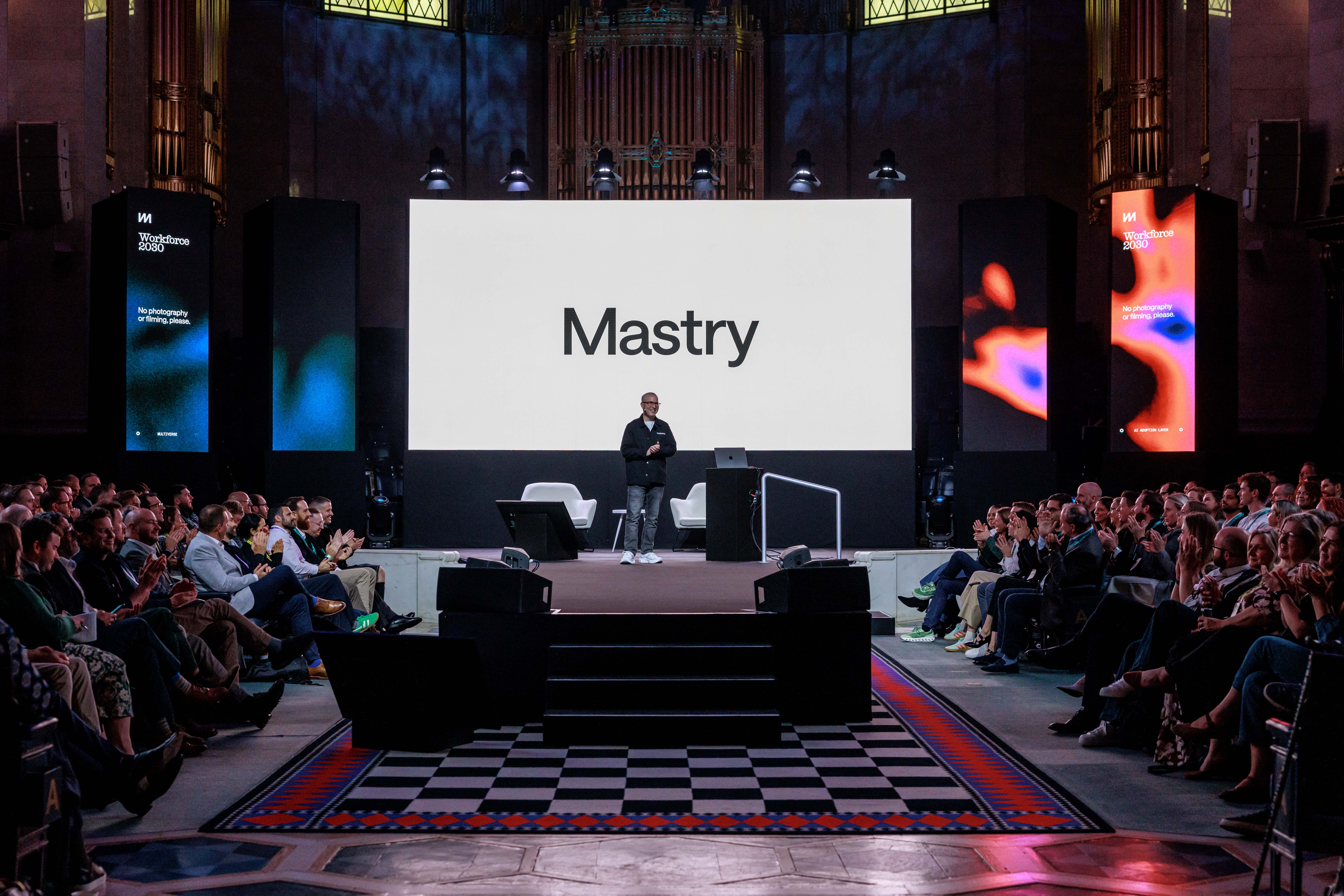 Jay Richman, Multiverse's Chief Product and Technology Officer, in front of a screen that says Mastry at our Workforce 2030 conference