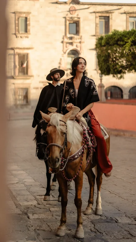 Traveler admiring the horizon from a cliff during an excursion with La Valise San Miguel Hotel.