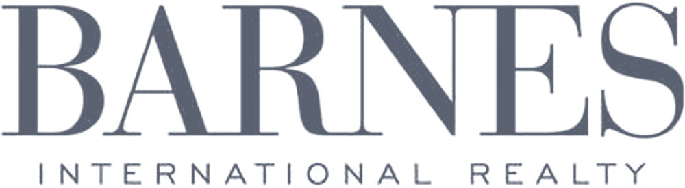 Barnes International Realty logo in gray serif letters.