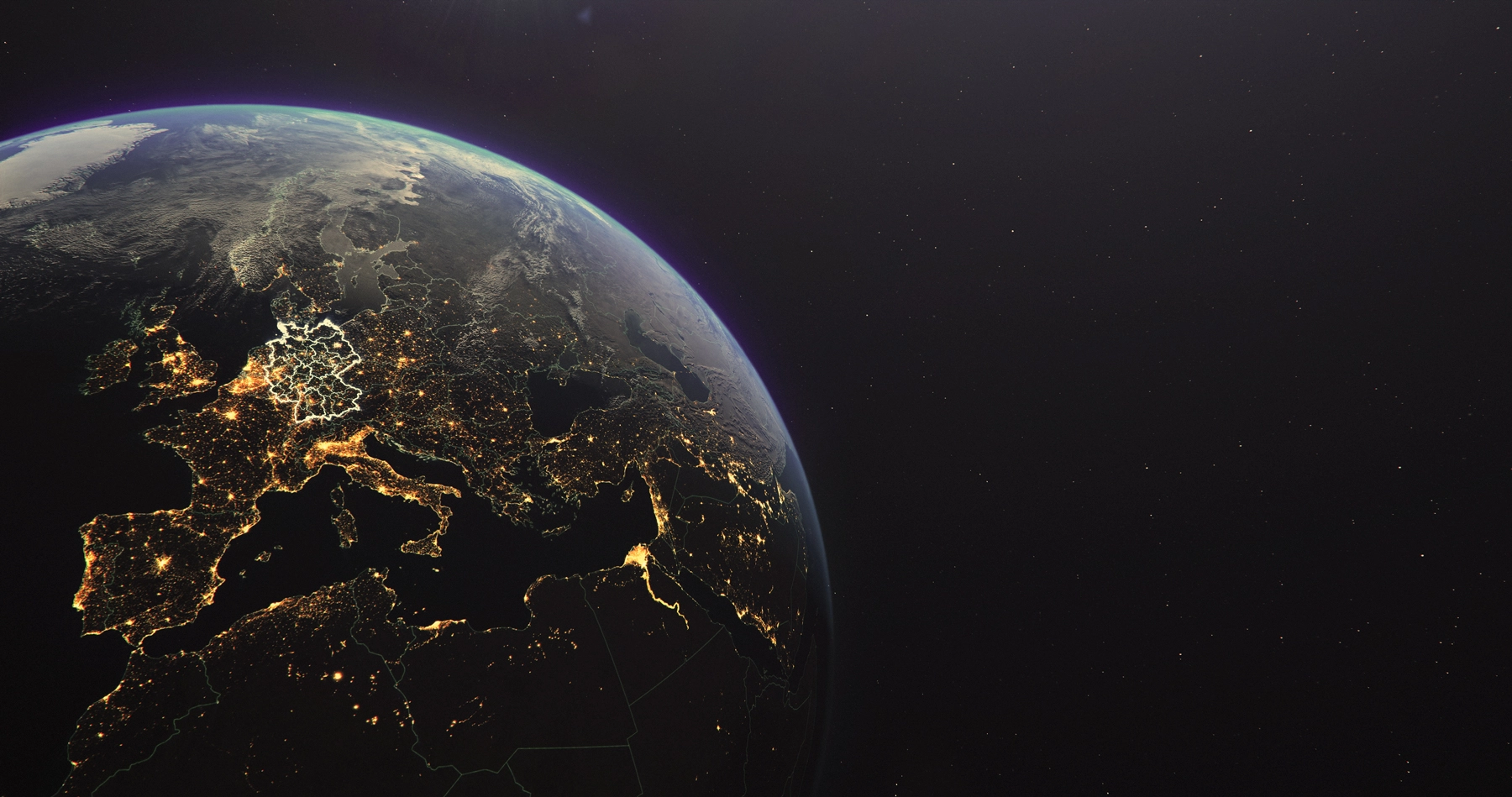 Satellite view of Earth at night showing Europe, North Africa, and parts of the Middle East with illuminated city lights, highlighting country borders in Western Europe including Germany.