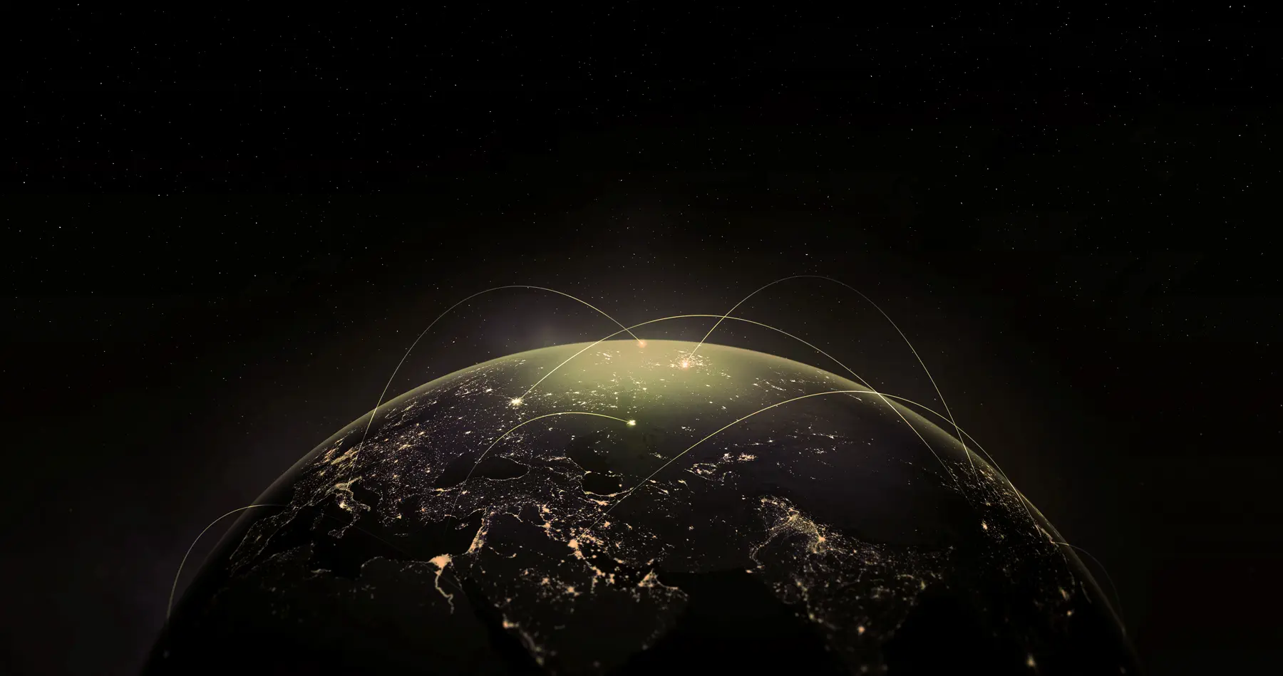 Partial view of Earth at night from space showing illuminated cities and arcs of light representing global digital or communications connections above the surface.