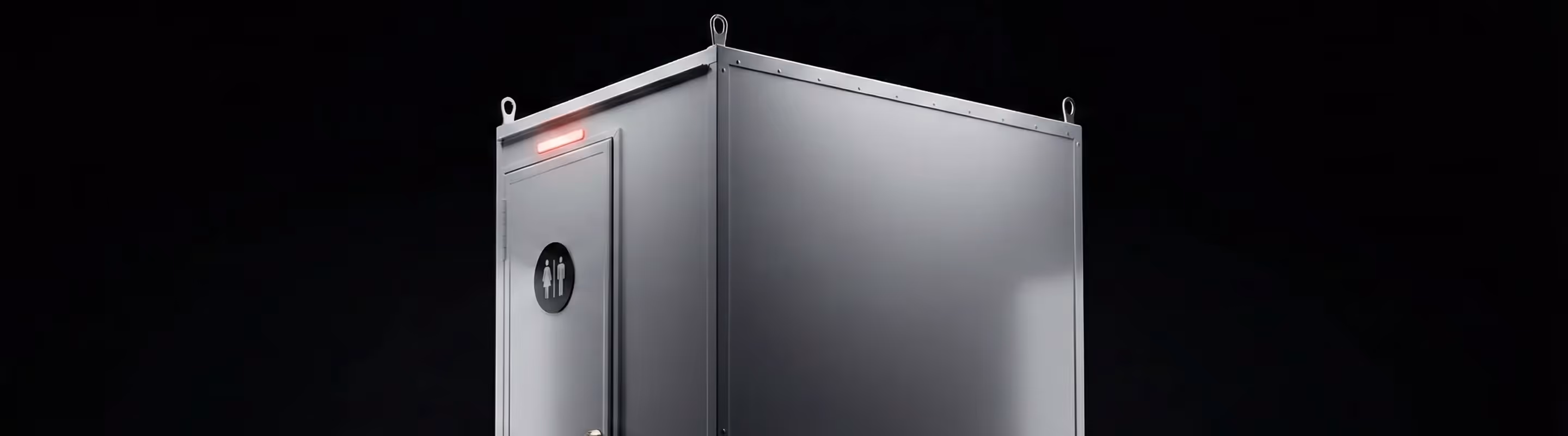 Metallic portable restroom unit with unisex signage and red indicator light on black background