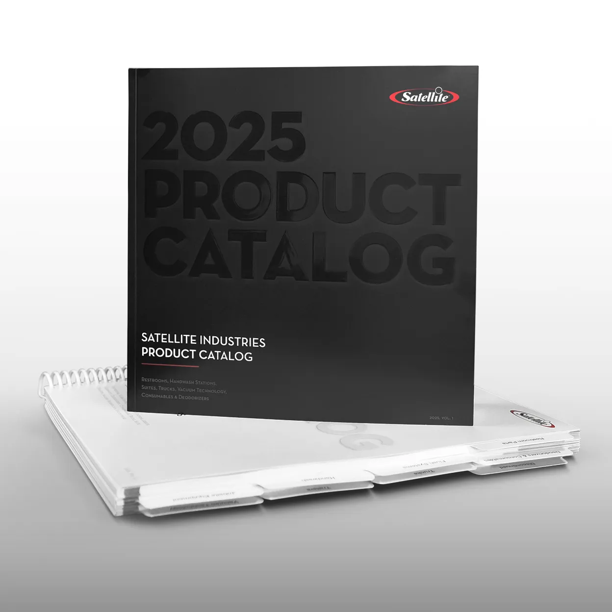 Stack of printed product catalogs with the 2025 Satellite Industries product catalog standing on top