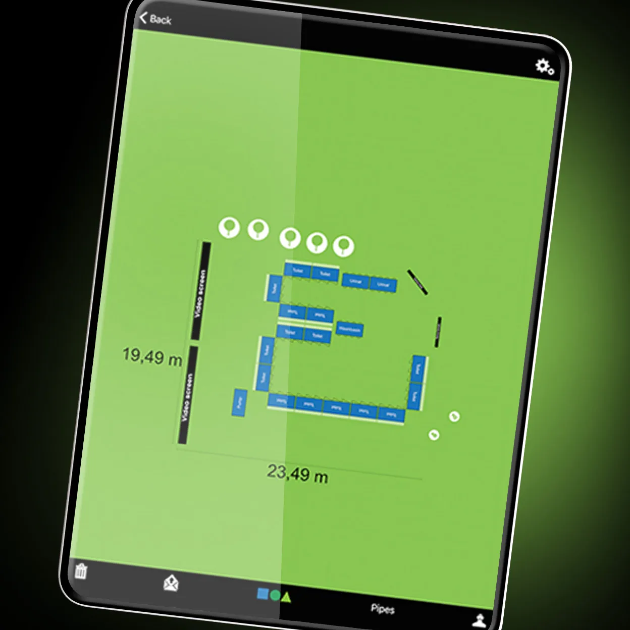 Tablet screen showing a digital layout plan with labeled blue units and measurements on a green background