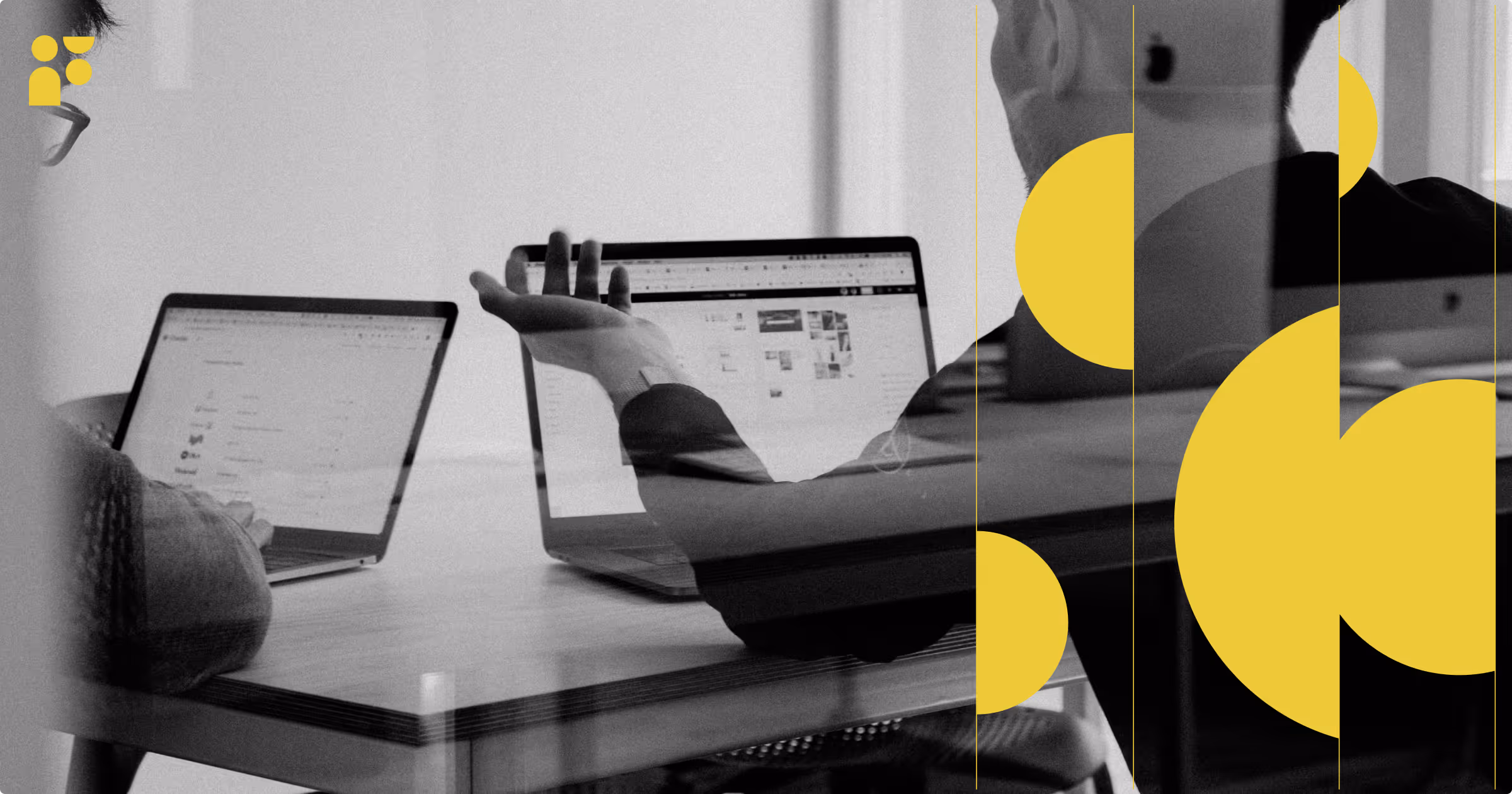 Two people working on laptops in a meeting room with yellow graphic overlays on the right side.