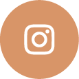 Instagram logo in white centered on a brown circular background.