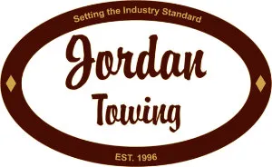 Jordan Towing logo with brown oval border, text 'Setting the Industry Standard' on top, and 'EST. 1996' at the bottom.