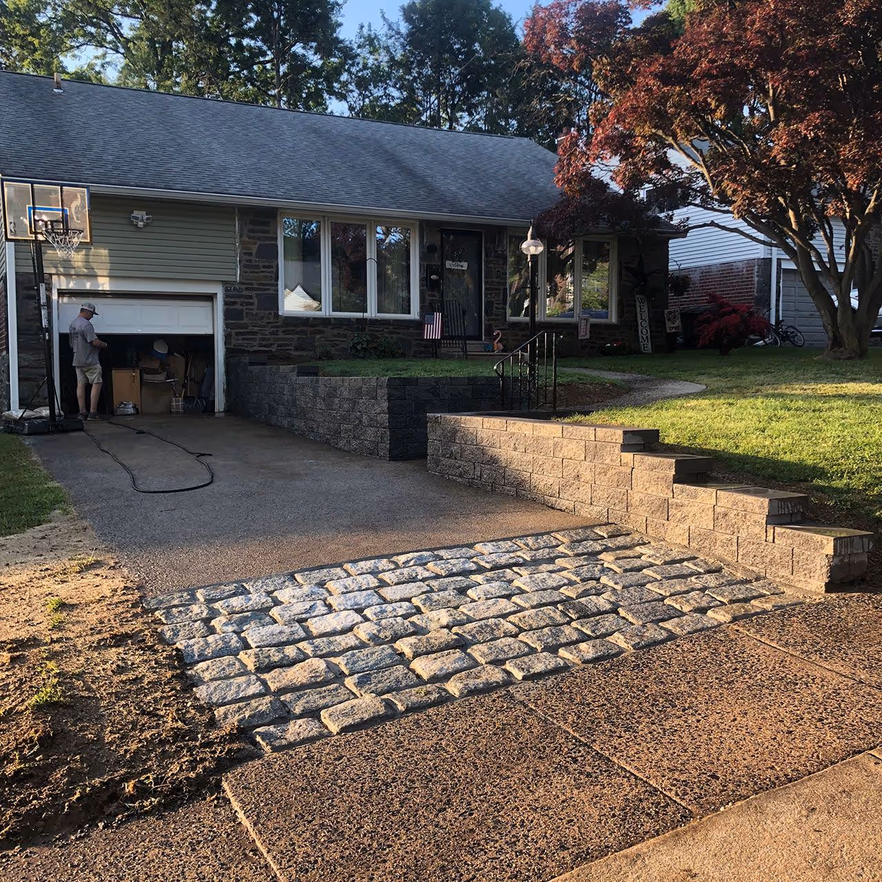 Hardscape paver patio installation by Long Meadow Lawn and Landscape in Oxford, PA for a custom outdoor living space