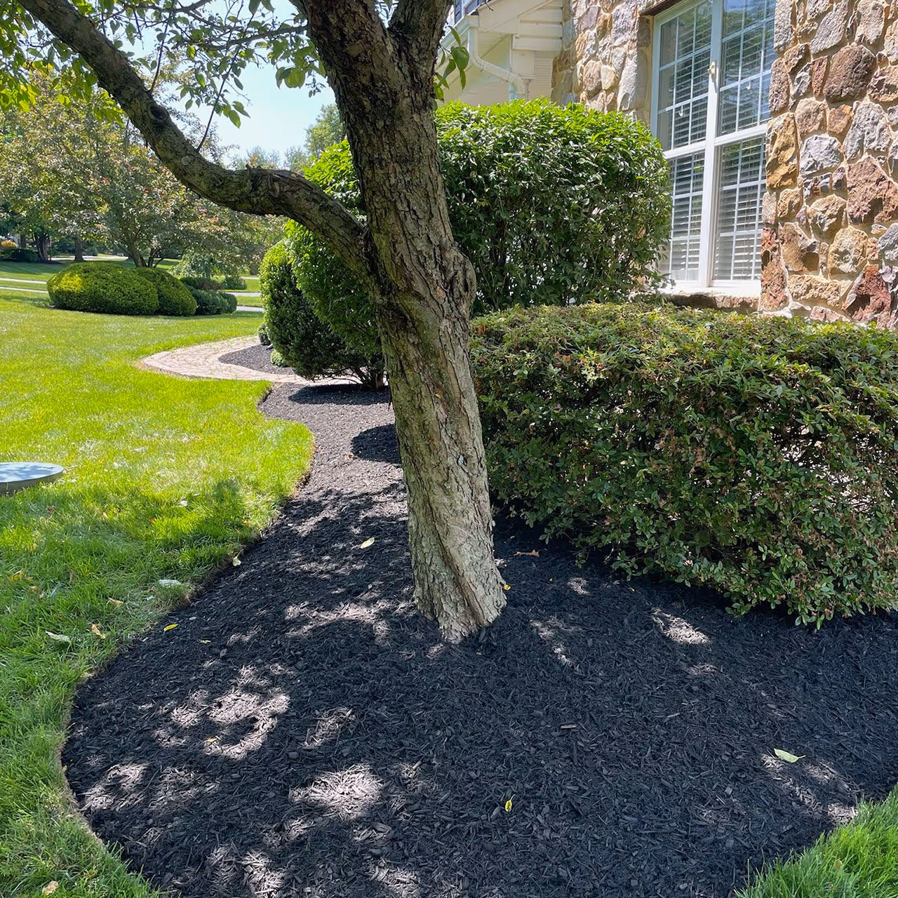 Mulch installation service by Long Meadow Lawn and Landscape