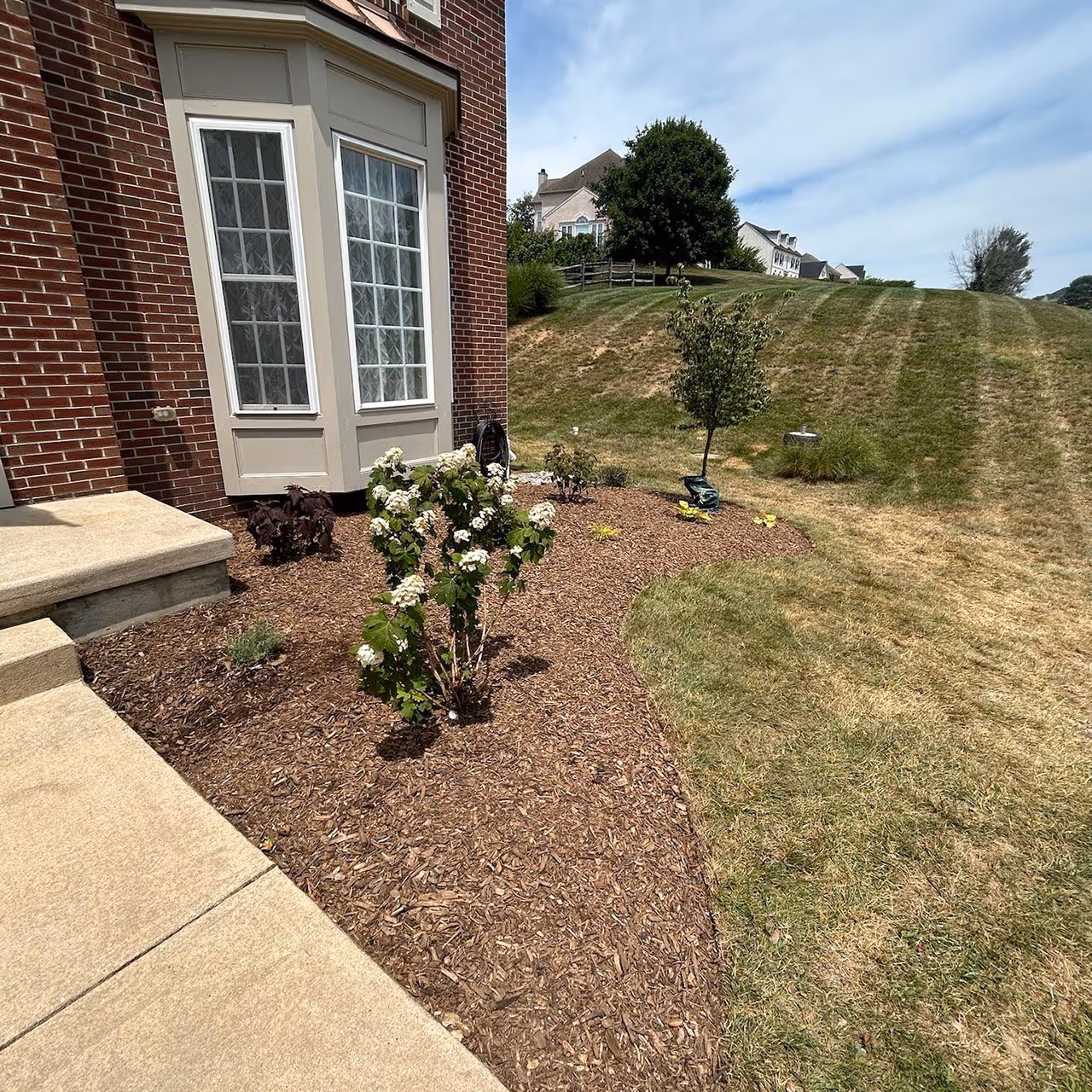 Mulch installation service by Long Meadow Lawn and Landscape in Oxford, PA