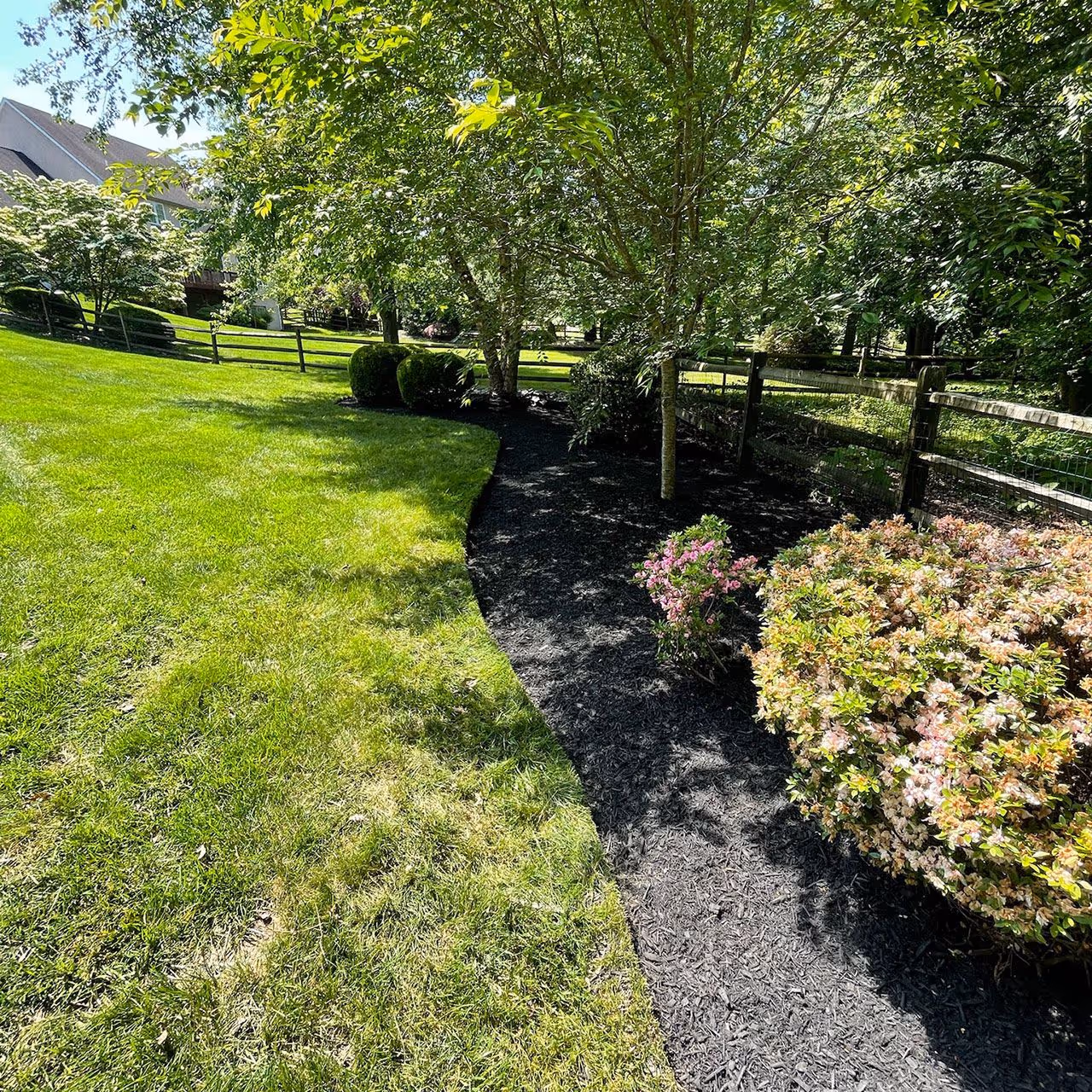 Mulch installation service by Long Meadow Lawn and Landscape